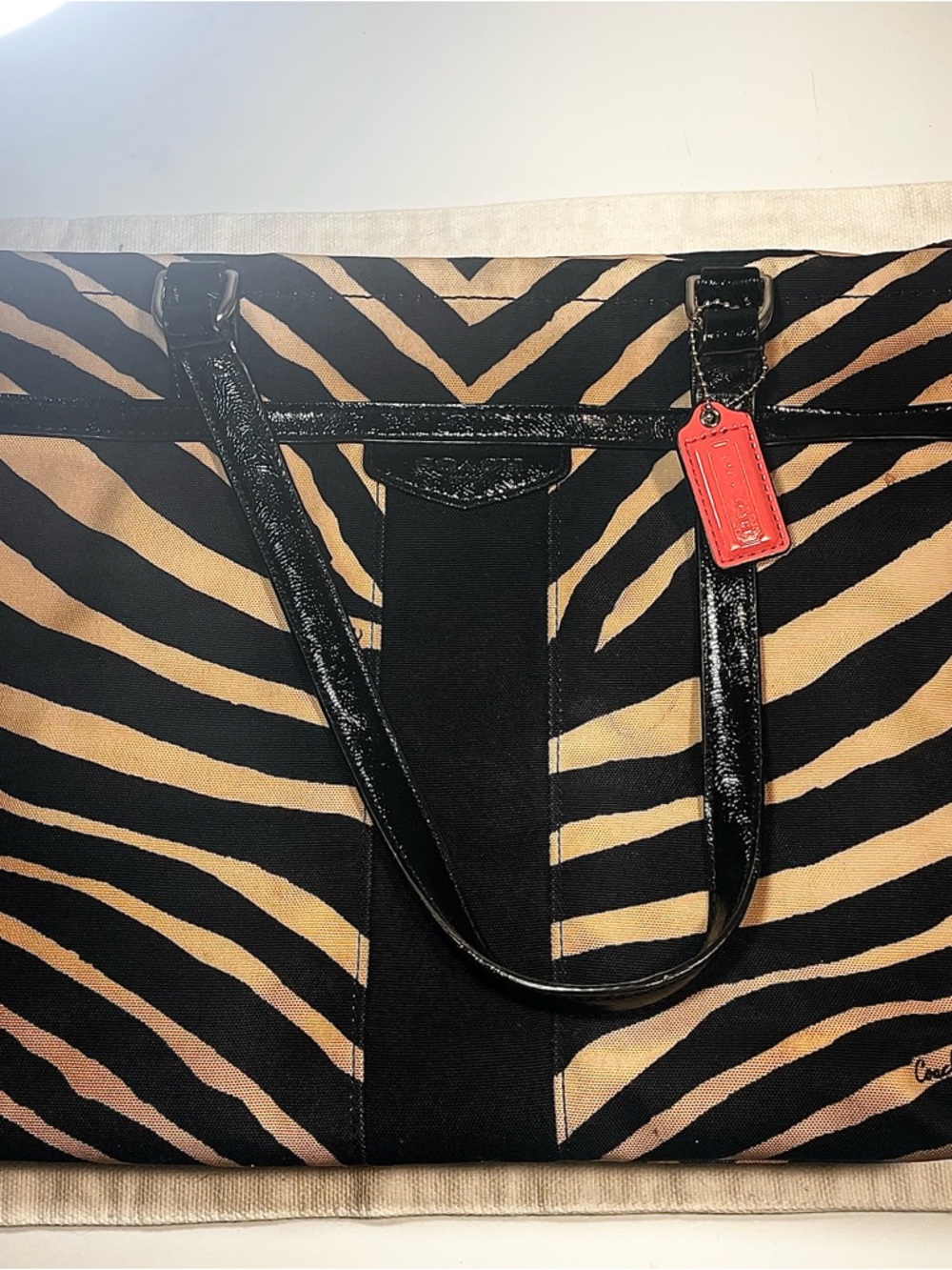 Coach Black and Tan Zebra Print Tote with Patent Black Handles